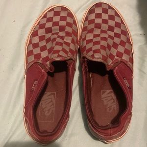maroon and dark grey checkered slip on Vans.